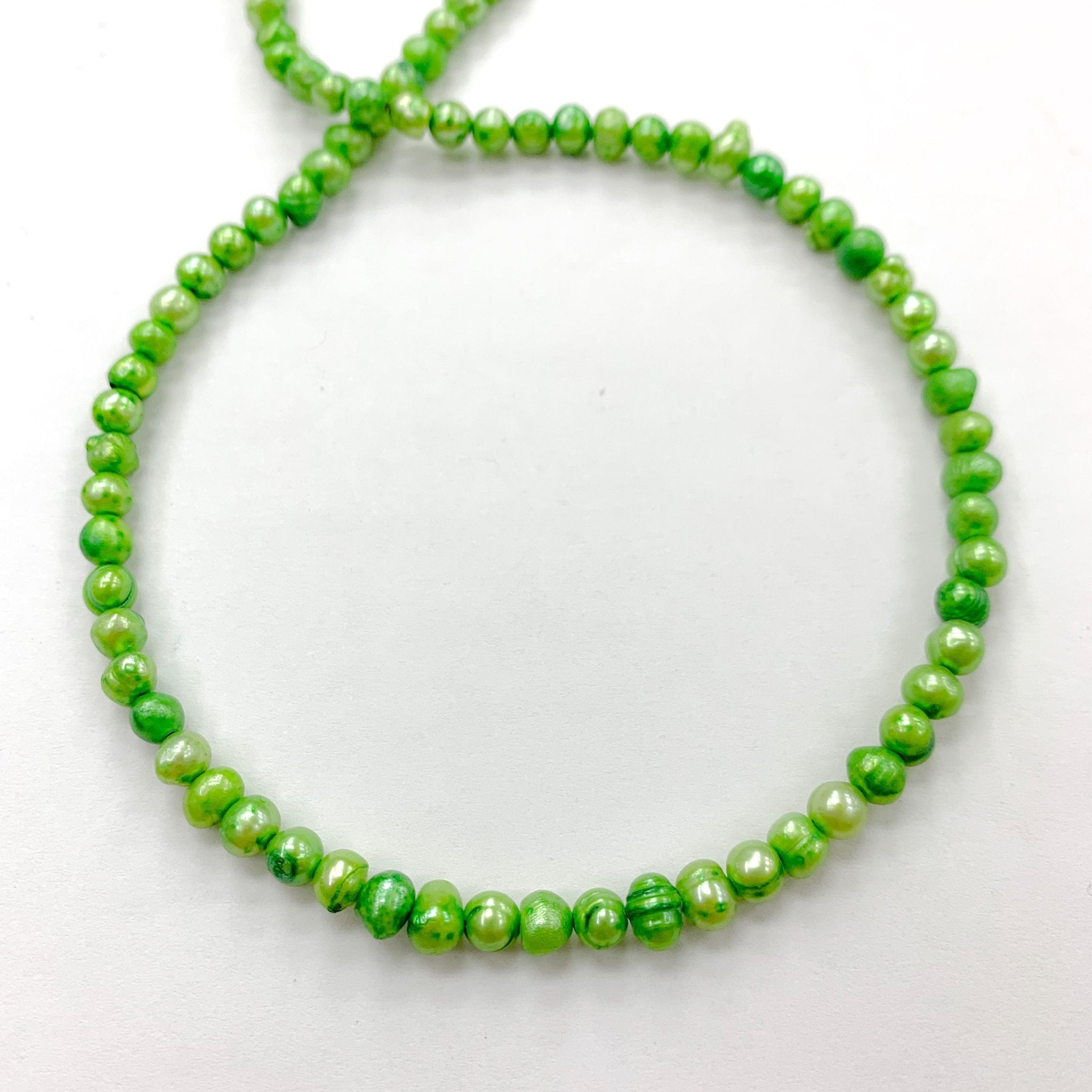 PERLA REDONDA IRREGULAR | VERDE | 5MM (22-15U) [2-53D]