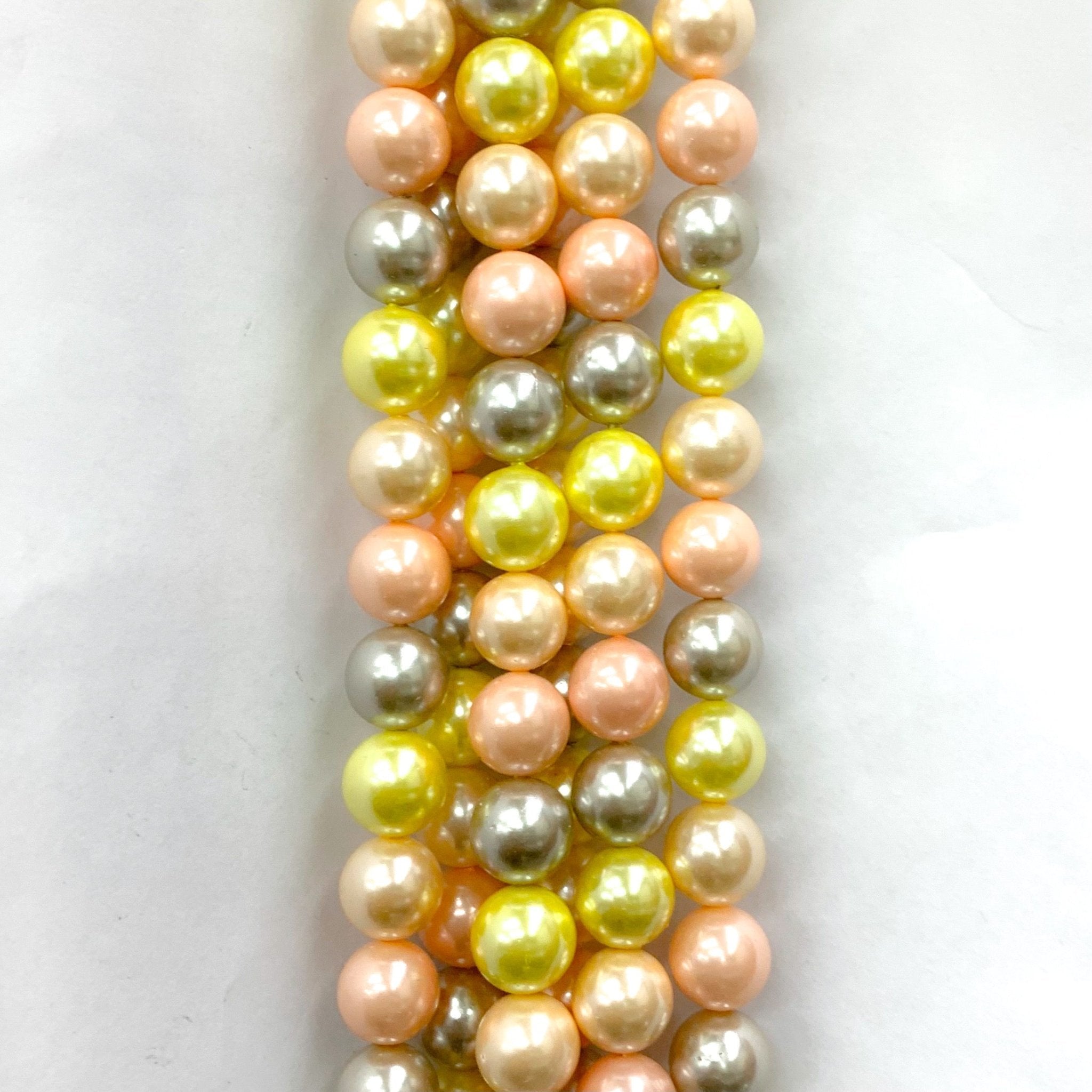 PERLA SHELL | 10MM | MIX ROSADO AMARILLO GRIS (10-15U)